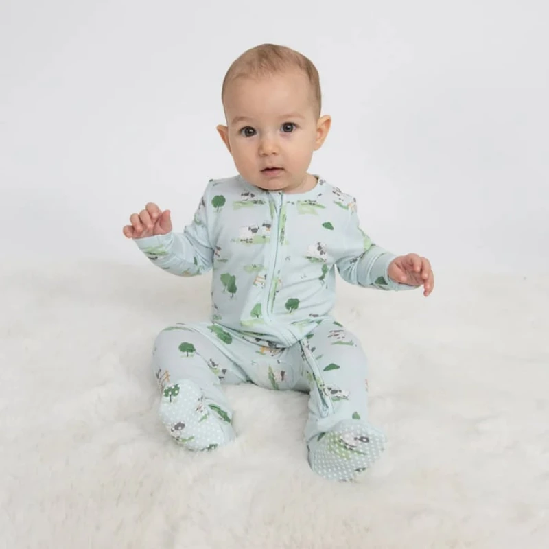 can newborn sleep in footie pajamas​