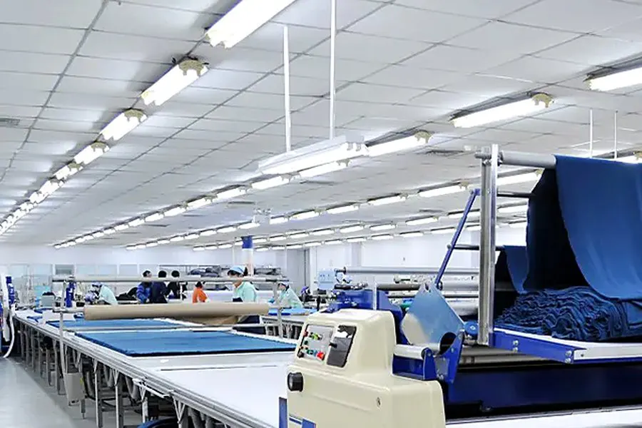 inside pajama factory spreading cutting
